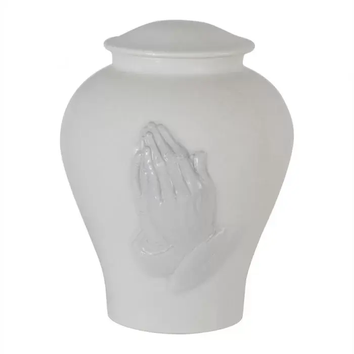 Urna cerámica con mano
